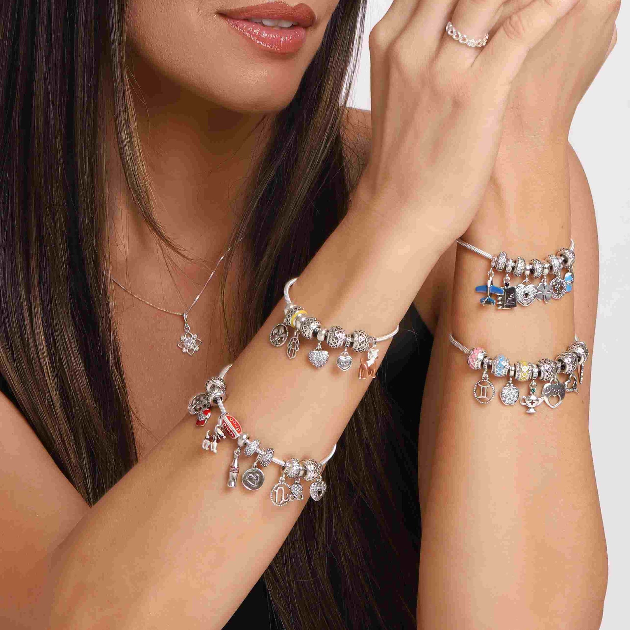 Berloque Flor de Liz Prata 925